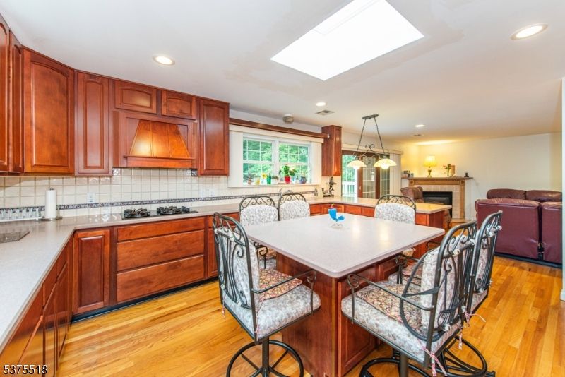 Dining room, Fireplace, Interior, Kitchen, Living room, Pendant Lights, Recessed Lighting, Wood Texture Flooring