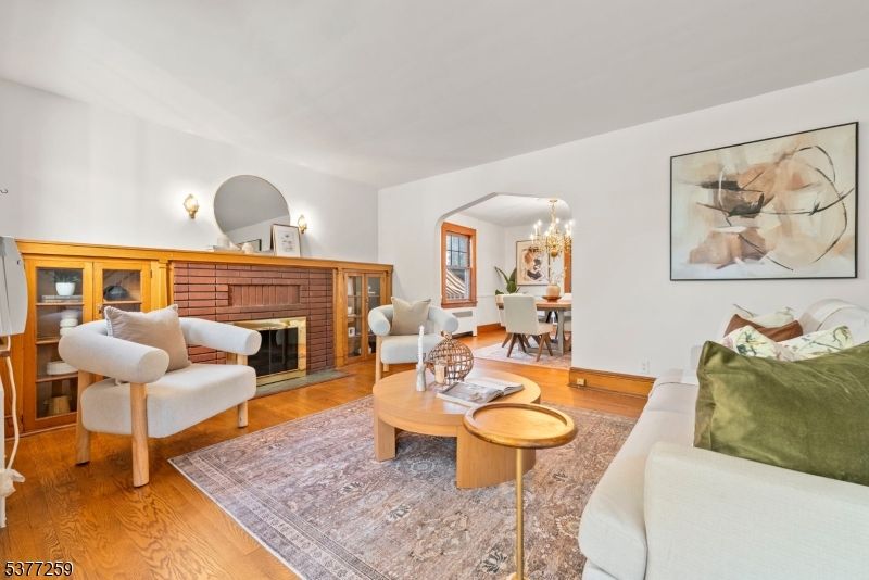 Chandelier, Dining room, Fireplace, Interior, Living room, Wood Texture Flooring