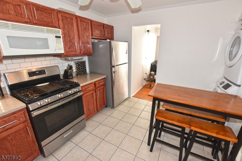 Interior, Kitchen, Stainless Steel Appliances, Washer, Wood Texture Flooring