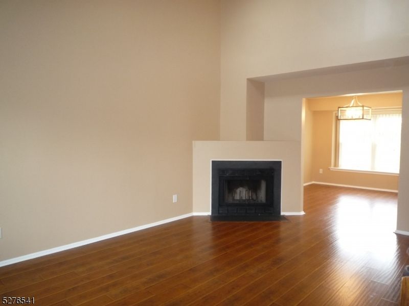 Empty room, Fireplace, Interior, Pendant Lights, Wood Texture Flooring