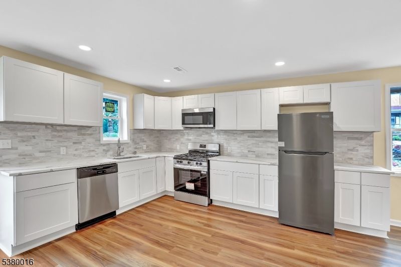 Interior, Kitchen, Recessed Lighting, Stainless Steel Appliances, Wood Texture Flooring