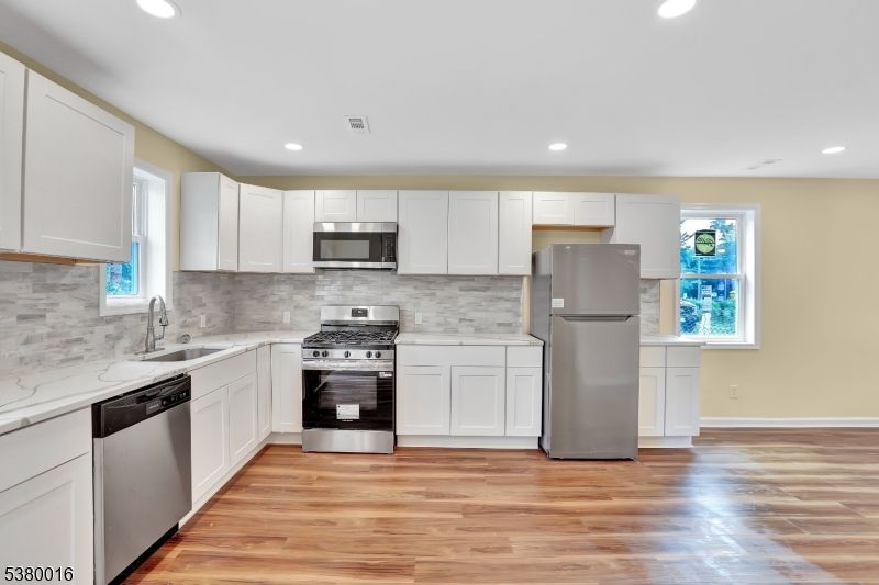 Interior, Kitchen, Recessed Lighting, Stainless Steel Appliances, Wood Texture Flooring