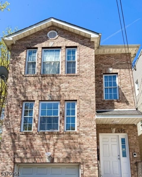 Attached, Exterior, Facade, Brick Facade, Rowhouse