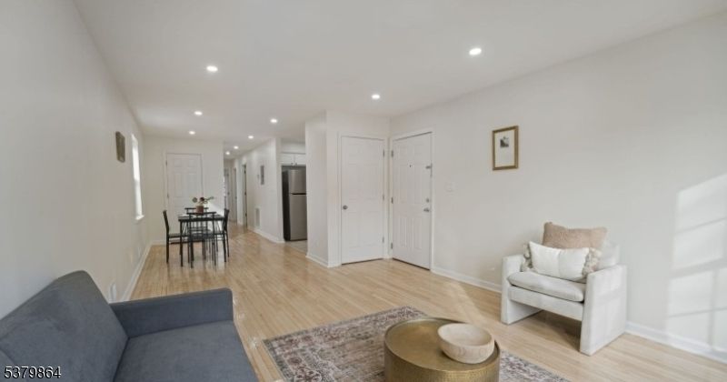 Dining room, Interior, Kitchen, Living room, Recessed Lighting, Stainless Steel Appliances, Wood Texture Flooring
