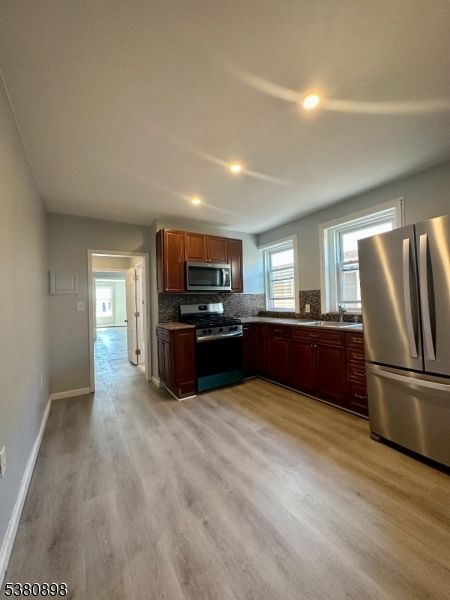 Interior, Kitchen, Recessed Lighting, Stainless Steel Appliances, Wood Texture Flooring