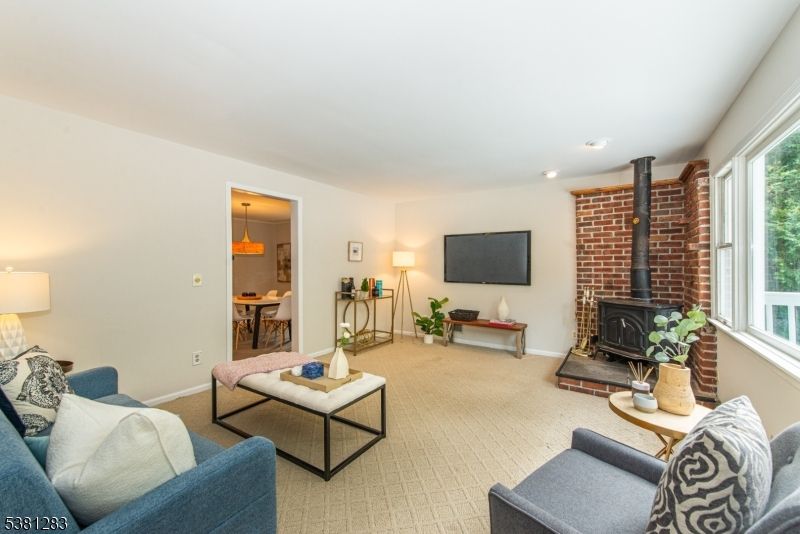 Dining room, Fireplace, Interior, Living room, Recessed Lighting, Stone Walls
