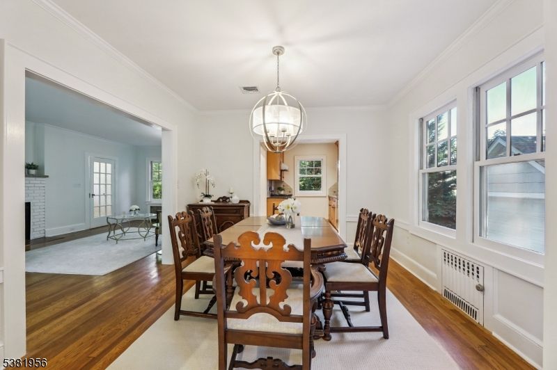 Dining room, Fireplace, Interior, Pendant Lights, Wood Texture Flooring