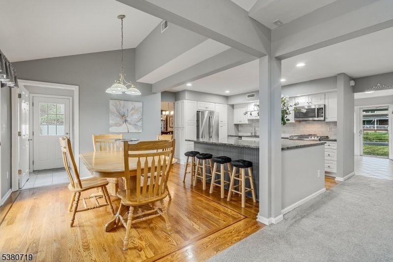 Dining room, Interior, Kitchen, Pendant Lights, Recessed Lighting, Stainless Steel Appliances, Wood Texture Flooring