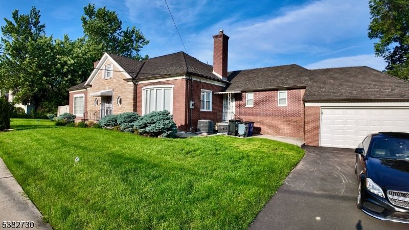 Attached, Backyard, Exterior, Facade, Brick Facade, French Provincial