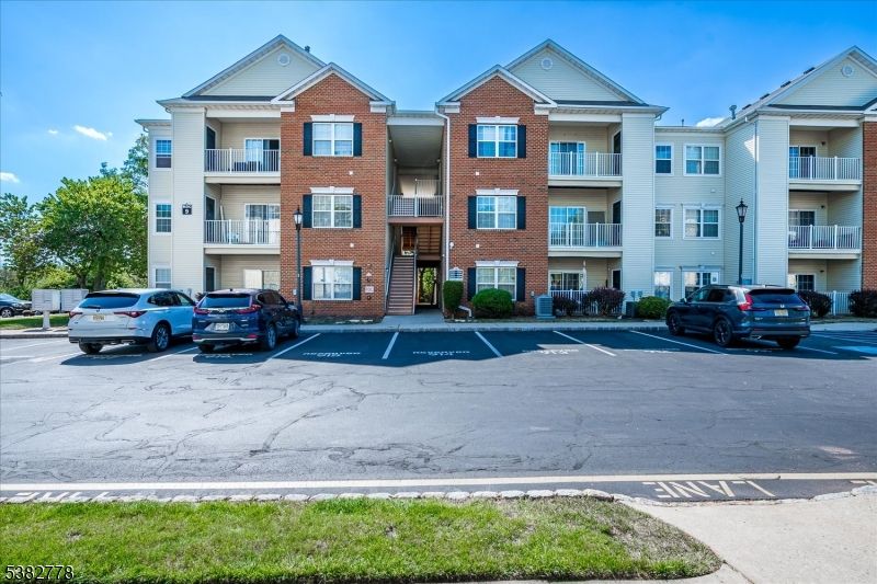 Exterior, Facade, Brick Facade, Condo Building