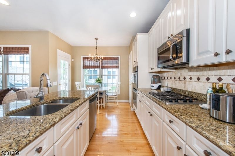 Chandelier, Dining room, Interior, Kitchen, Recessed Lighting, Wood Texture Flooring
