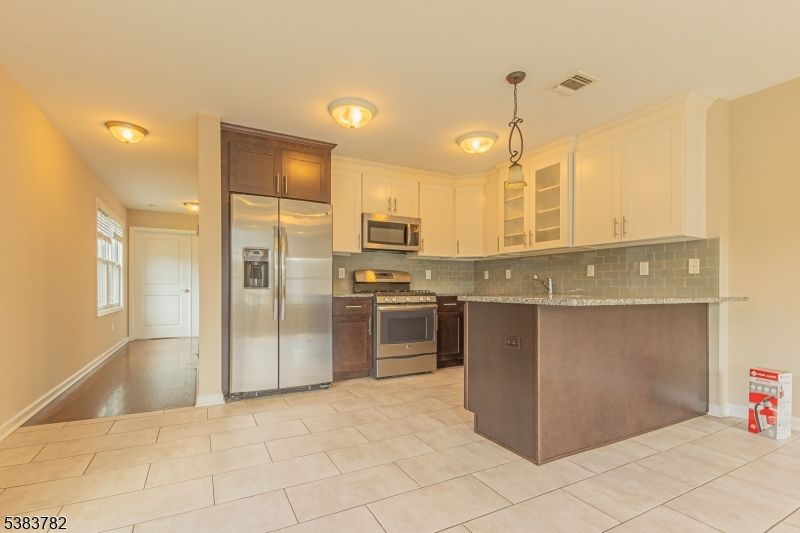 Interior, Kitchen, Pendant Lights, Stainless Steel Appliances, Wood Texture Flooring