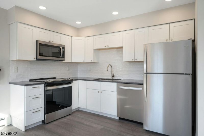 Interior, Kitchen, Recessed Lighting, Stainless Steel Appliances, Wood Texture Flooring