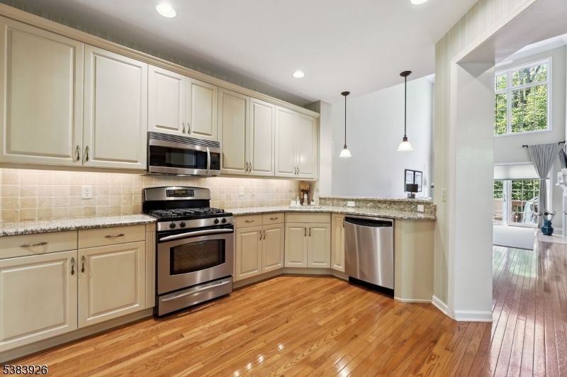 Interior, Kitchen, Pendant Lights, Recessed Lighting, Stainless Steel Appliances, Wood Texture Flooring