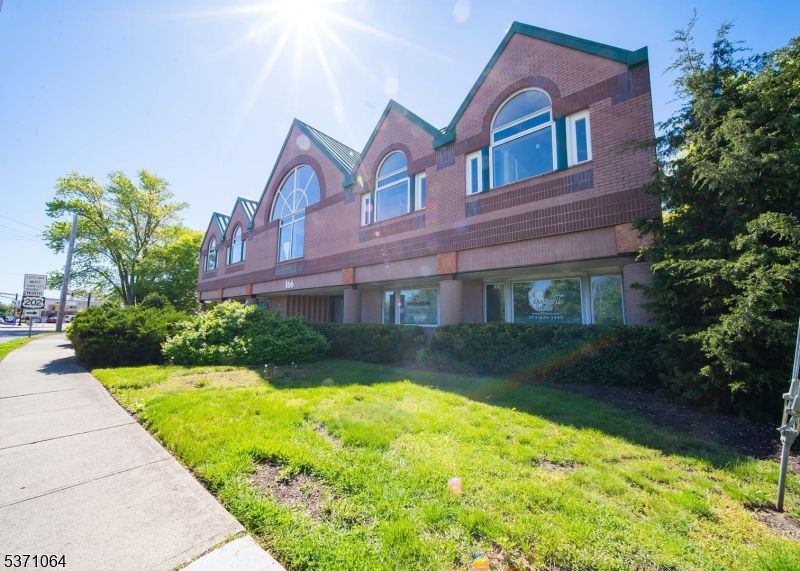 Exterior, Facade, Brick Facade, Cape Cod