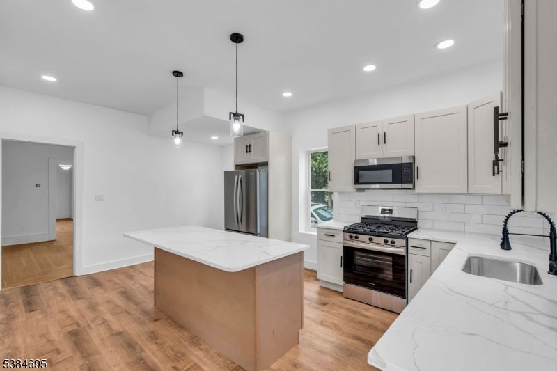 Interior, Kitchen, Pendant Lights, Recessed Lighting, Stainless Steel Appliances, Wood Texture Flooring