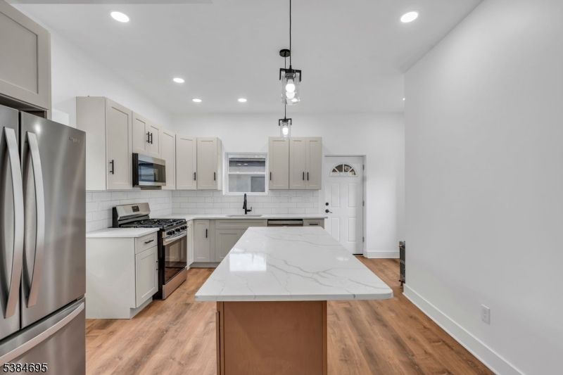 Interior, Kitchen, Pendant Lights, Recessed Lighting, Stainless Steel Appliances, Wood Texture Flooring