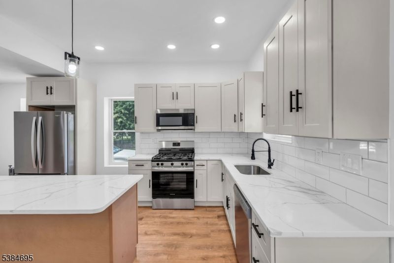 Interior, Kitchen, Pendant Lights, Recessed Lighting, Stainless Steel Appliances, Wood Texture Flooring