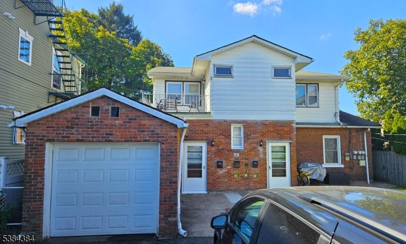 Attached, Exterior, Facade, Brick Facade, Brick Traditional