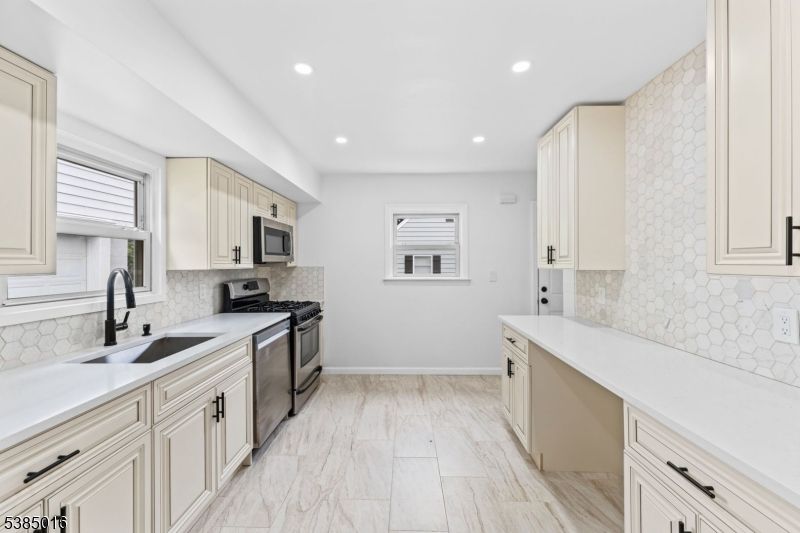 Interior, Kitchen, Marble, Recessed Lighting, Stainless Steel Appliances, Wood Texture Flooring