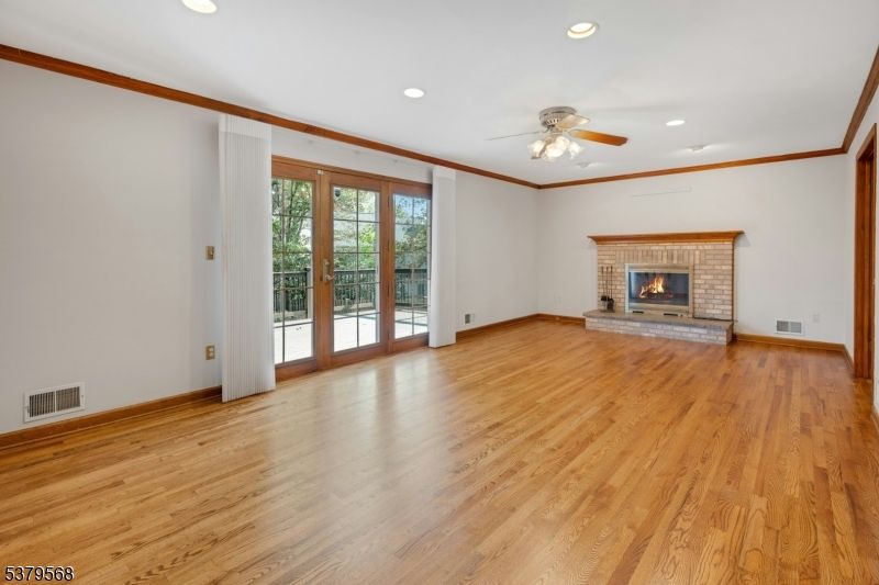 Empty room, Fireplace, Interior, Recessed Lighting, Wood Texture Flooring
