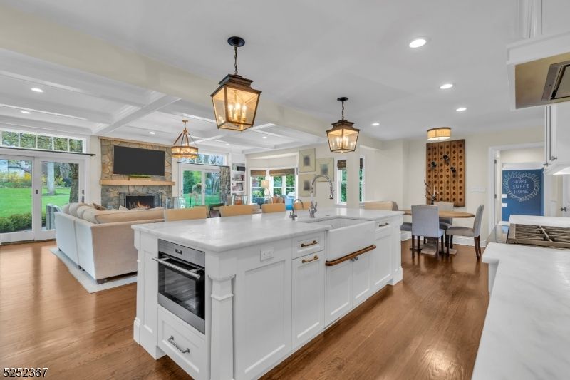 Dining room, Fireplace, Interior, Kitchen, Living room, Pendant Lights, Recessed Lighting, Wood Texture Flooring
