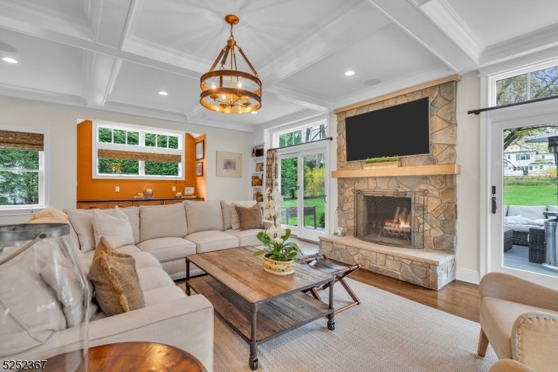Chandelier, Fireplace, Interior, Living room, Recessed Lighting, Wood Texture Flooring