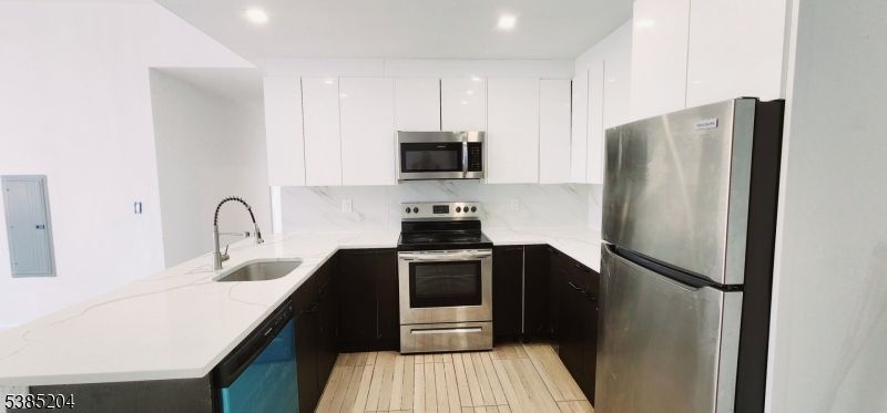 Interior, Kitchen, Recessed Lighting, Stainless Steel Appliances, Wood Texture Flooring