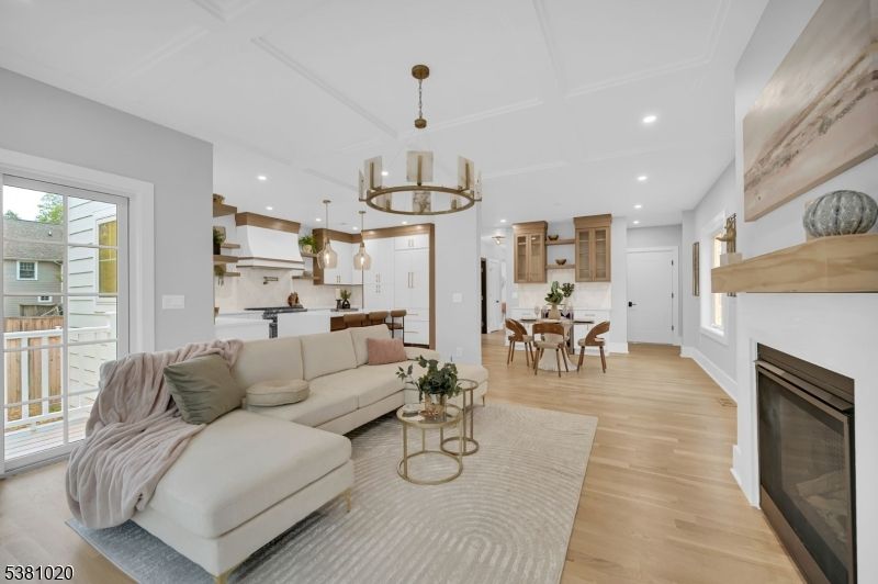 Dining room, Fireplace, Interior, Kitchen, Living room, Pendant Lights, Recessed Lighting, Wood Texture Flooring