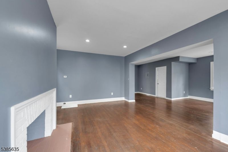 Empty room, Fireplace, Interior, Recessed Lighting, Wood Texture Flooring