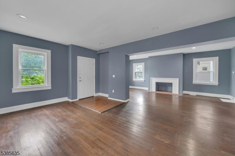 Empty room, Fireplace, Interior, Recessed Lighting, Wood Texture Flooring