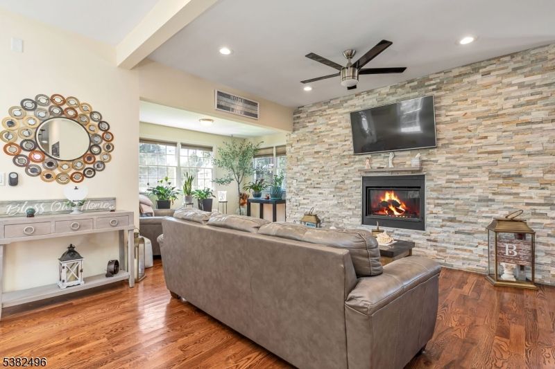 Fireplace, Interior, Living room, Recessed Lighting, Stone Walls, Wood Texture Flooring