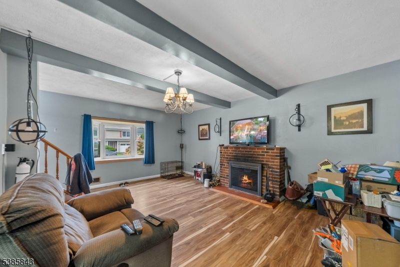 Chandelier, Fireplace, Interior, Living room, Wooden Beams, Wood Texture Flooring