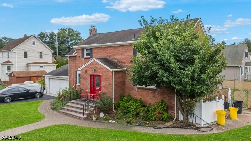 Attached, Exterior, Facade, Brick Facade, Tudor Revival