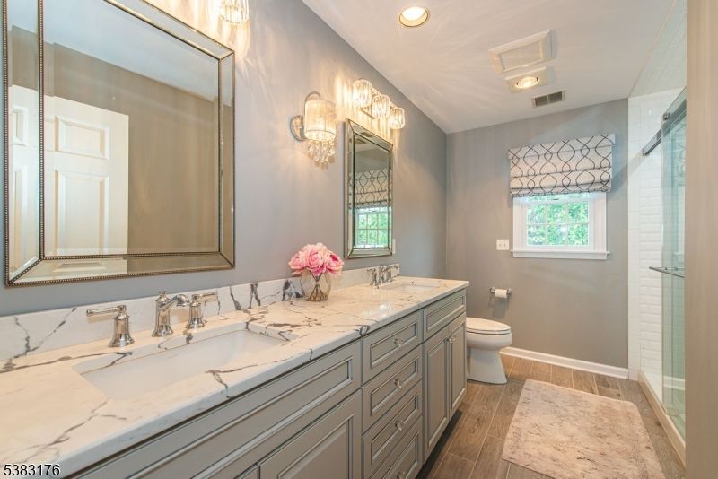 Bathroom, Dual Sink Vanities, Glass Shower, Interior, Recessed Lighting, Wood Texture Flooring