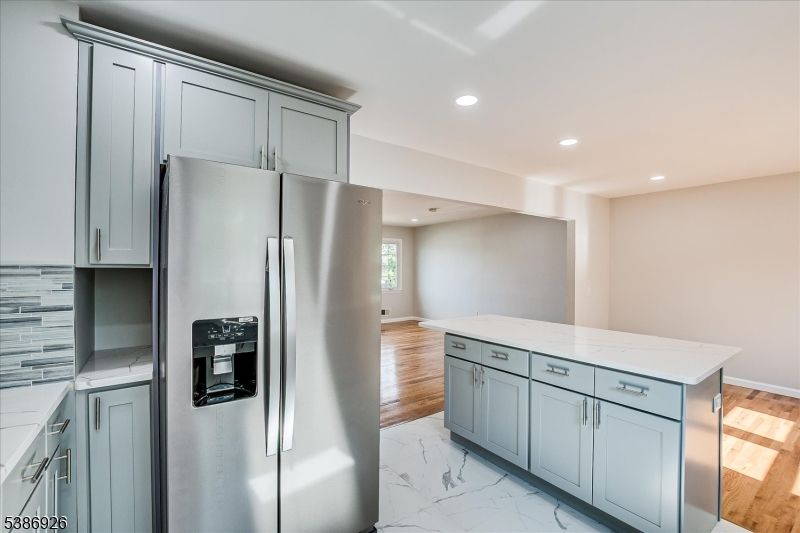 Interior, Kitchen, Marble, Recessed Lighting, Stainless Steel Appliances, Wood Texture Flooring