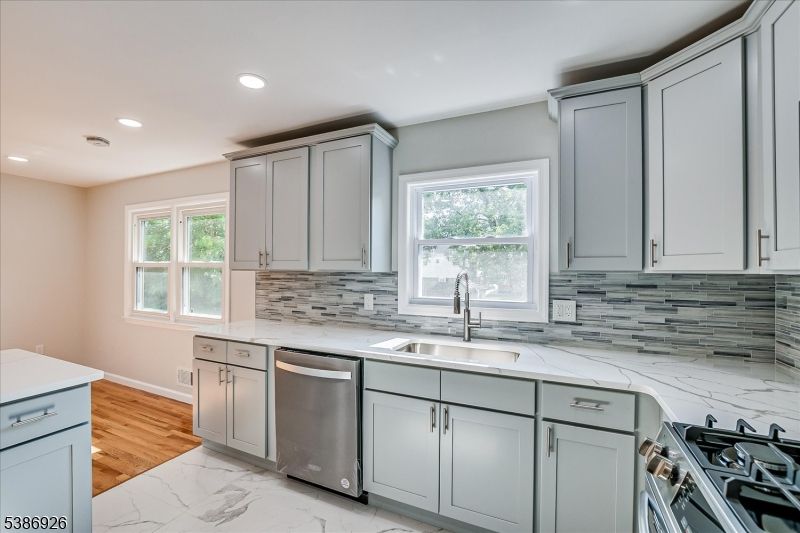 Interior, Kitchen, Marble, Recessed Lighting, Stainless Steel Appliances, Wood Texture Flooring