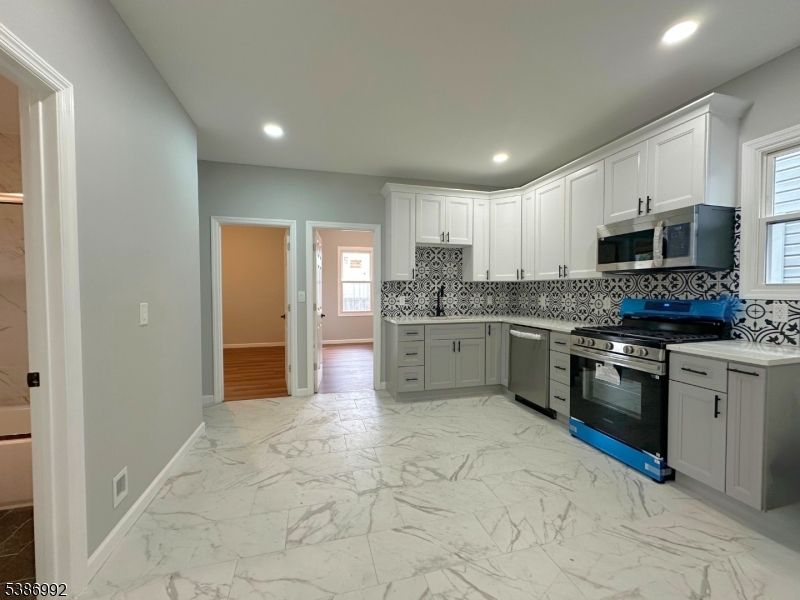 Interior, Kitchen, Marble, Recessed Lighting, Stainless Steel Appliances