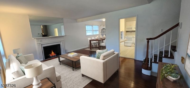Chandelier, Dining room, Fireplace, Interior, Living room, Wood Texture Flooring