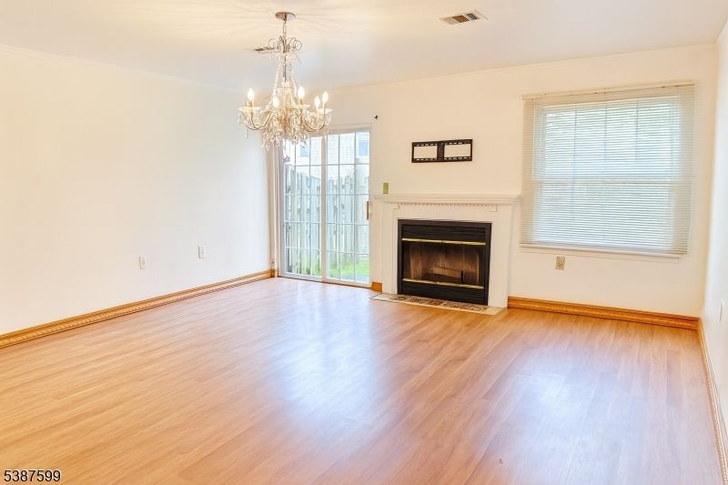 Chandelier, Empty room, Fireplace, Interior, Wood Texture Flooring