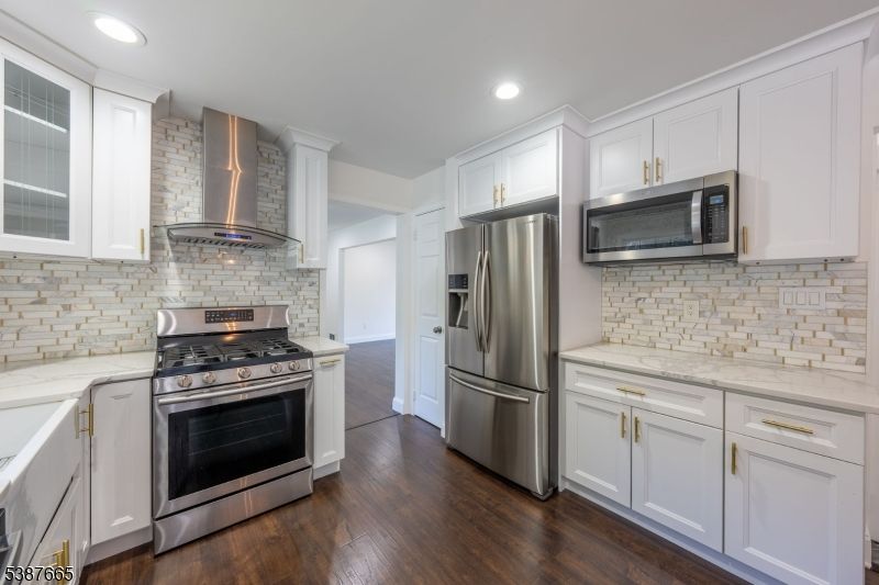 Interior, Kitchen, Recessed Lighting, Stainless Steel Appliances, Stone Walls, Wood Texture Flooring