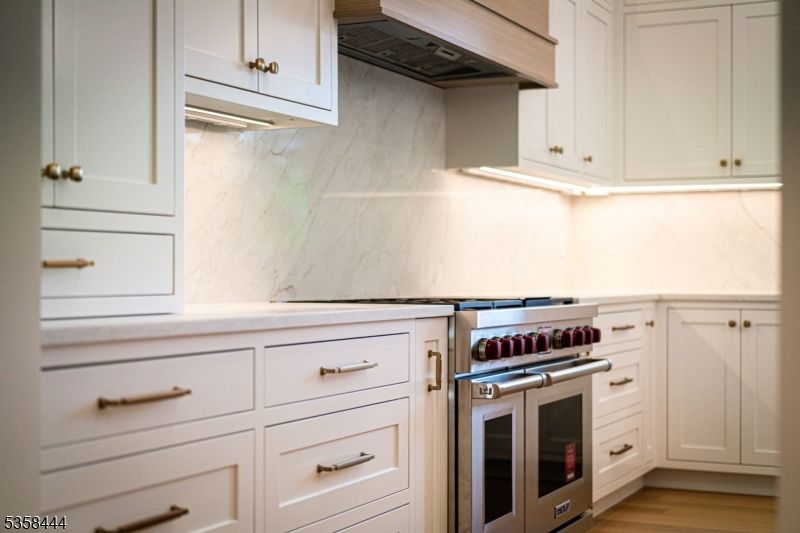 Interior, Kitchen, Marble Walls, Stainless Steel Appliances, Wood Texture Flooring