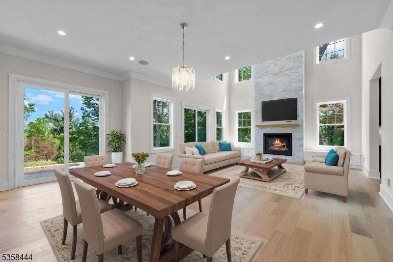 Chandelier, Dining room, Fireplace, Interior, Living room, Recessed Lighting, Stone Walls, Wood Texture Flooring