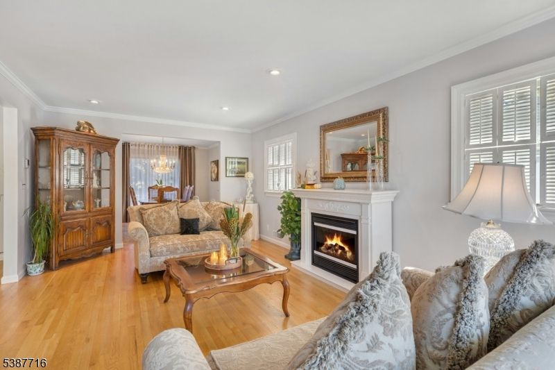 Chandelier, Dining room, Fireplace, Interior, Living room, Recessed Lighting, Wood Texture Flooring