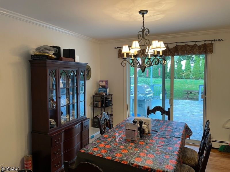 Chandelier, Dining room, Interior, Wood Texture Flooring