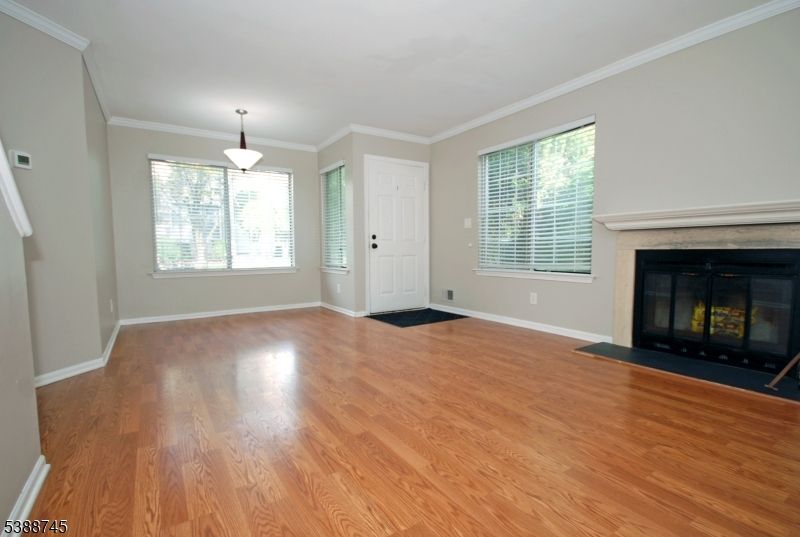 Empty room, Fireplace, Interior, Pendant Lights, Wood Texture Flooring