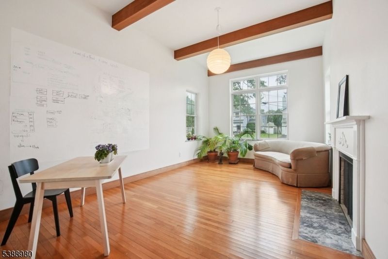Dining room, Fireplace, Interior, Pendant Lights, Wooden Beams, Wood Texture Flooring