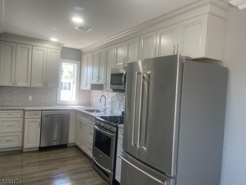 Interior, Kitchen, Recessed Lighting, Stainless Steel Appliances, Wood Texture Flooring