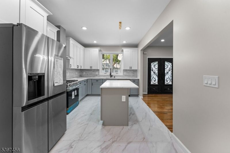 Interior, Kitchen, Marble, Recessed Lighting, Stainless Steel Appliances, Wood Texture Flooring