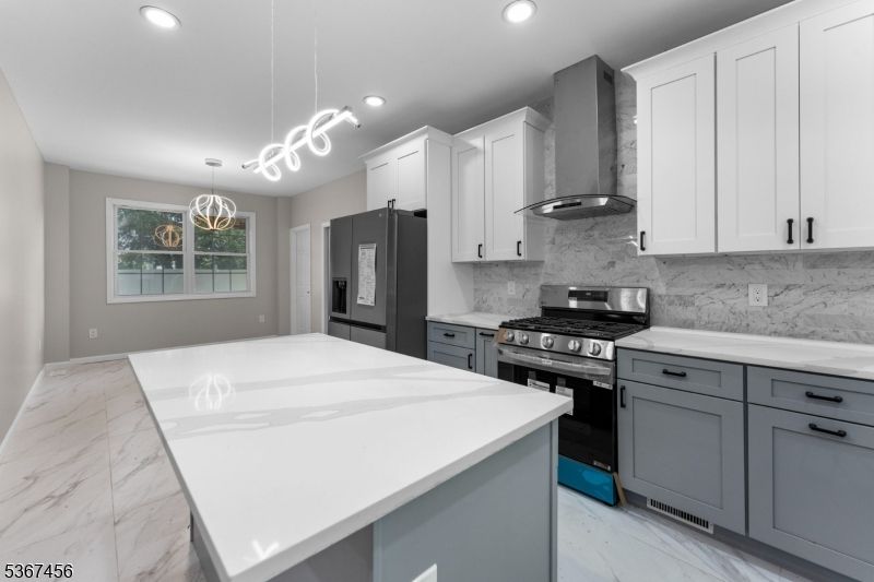 Interior, Kitchen, Marble, Marble Walls, Pendant Lights, Recessed Lighting, Stainless Steel Appliances